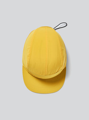 The Janji AFO Hyperlight Cap in Goldenray on a neutral background.