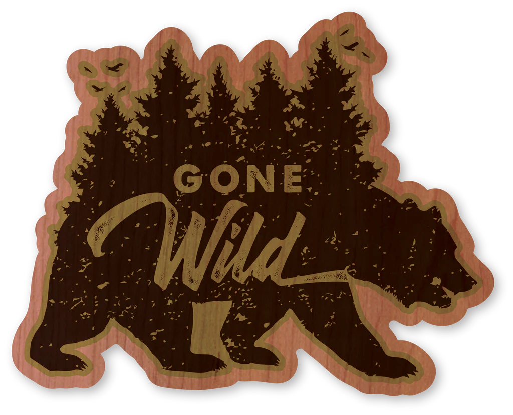 Dust City sustainable wood sticker depicting a bear with a forest and the phrase Gone Wild.