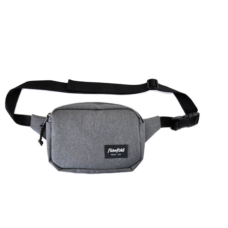 Flowfold Explorer Pack Small, made in the USA in Recycled Heather Grey, on a neutral background.