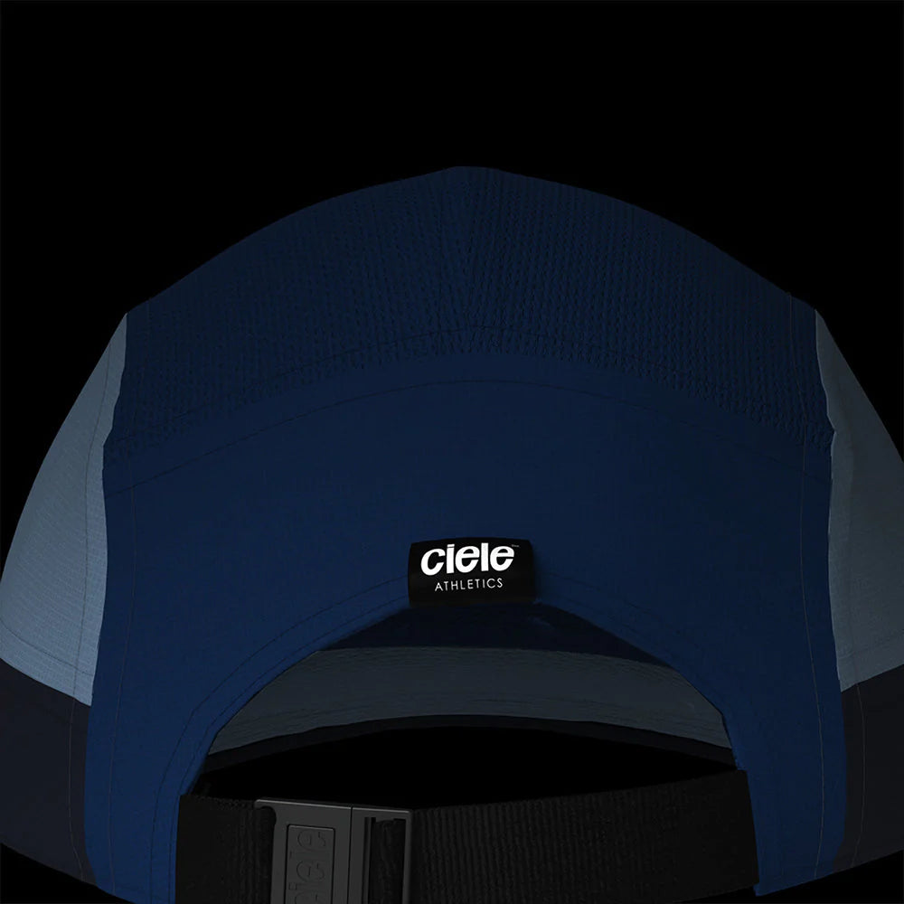 Ciele Athletics GOCap SC - C Plus Box in Indifar from the rear on a dark background to show the reflective detailing.