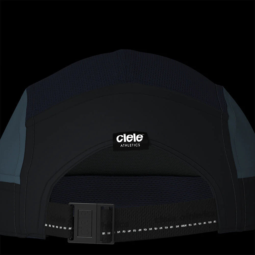 Ciele Athletics GOCap - Since in Ironcast from the rear on a dark background to show the reflective detailing.