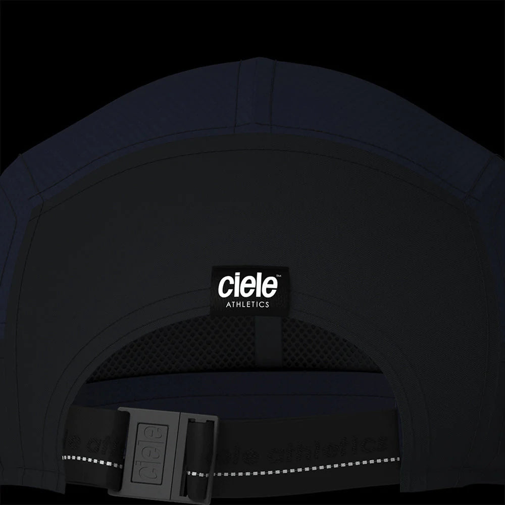 Ciele Athletics PBCap - C-Cube in Ironcast from the rear on a dark background showing the reflective detailing.