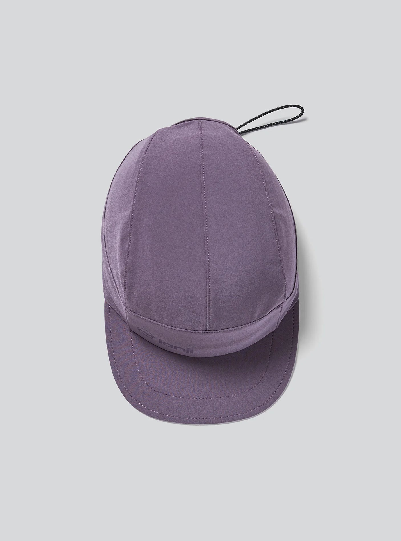 The Janji AFO Hyperlight Cap in Massif on a neutral background.