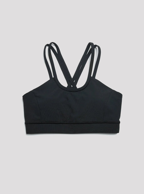 Janji W's Pace Sports Bra in Midnight on a neutral background.