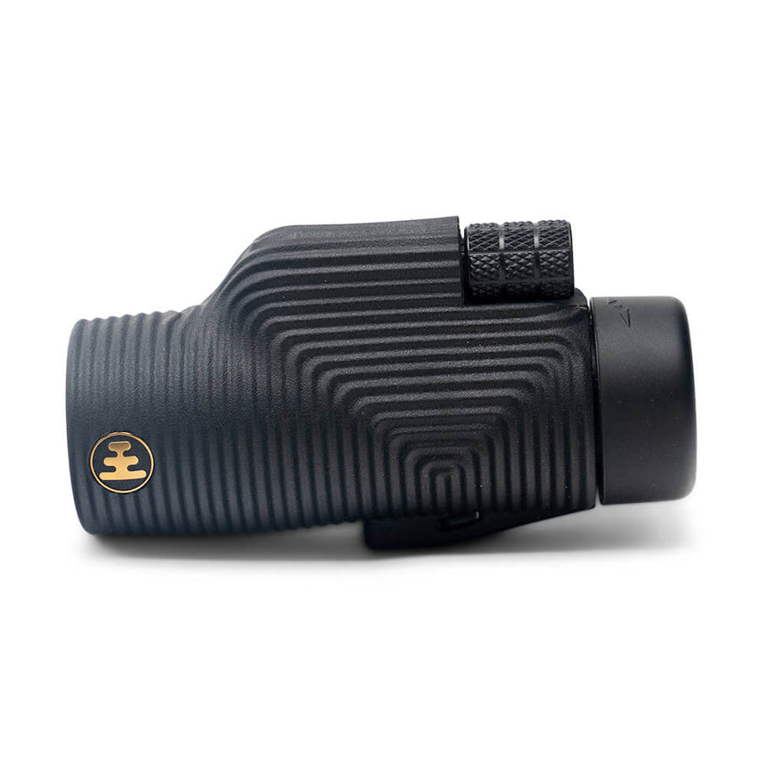 Nocs Provisions Zoom Tube 8x32 Monocular in Obsidian Black from the side on a neutral background.