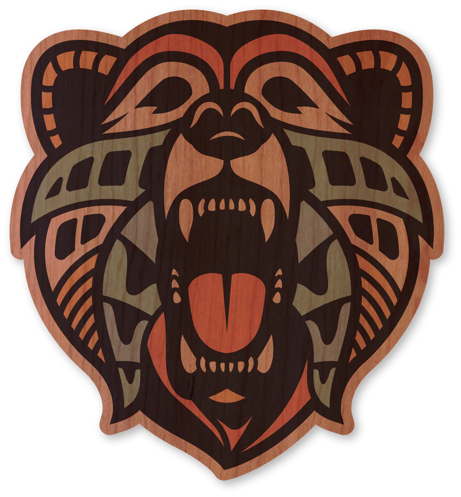 Dust City sustainable wood sticker printed on cherry wood and featuring a colorful tribal style bear face.