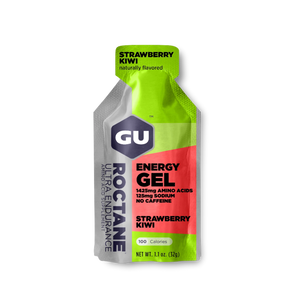 Gu Roctane Energy Gel in Strawberry Kiwi on a neutral background.