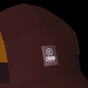 Ciele Athletics GOCap SC - C Plus Box in Rok Rouge from the front on a dark background to show the reflective detailing.