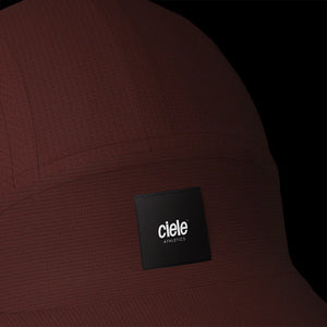 Ciele Athletics RDCap SC in Rouge on a dark background to show the reflective detailing.