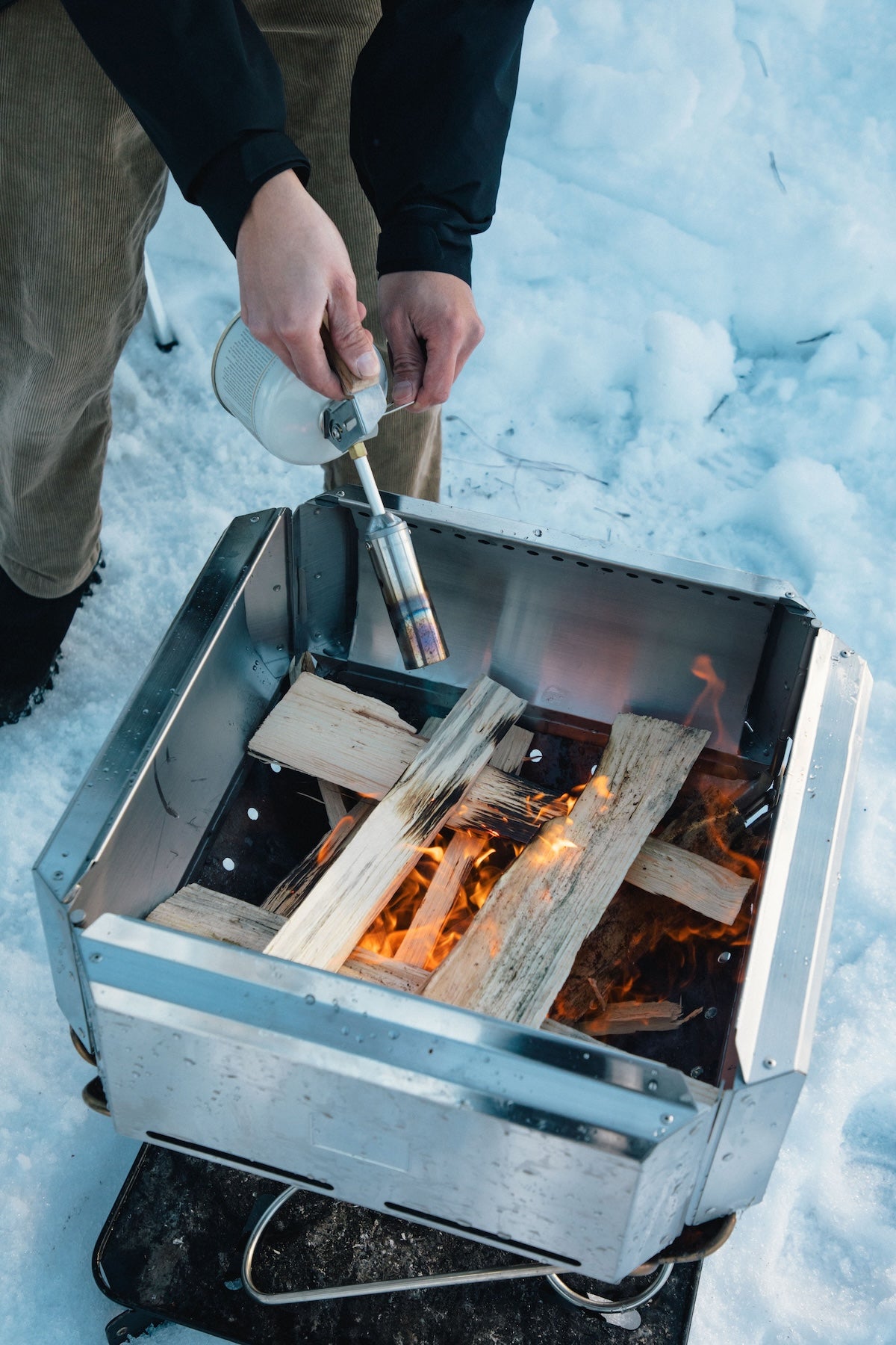 Snow Peak Folding Torch camp fire starter outdoors.