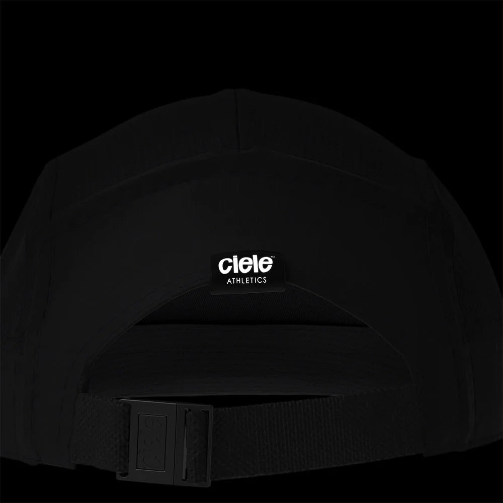 Ciele Athletics GOCap - Athletics in Shadowcast from the rear on a dark background to show the reflective detailing.