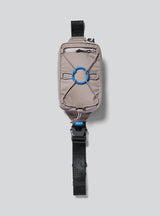 Janji Multipass Mini 1L running sling bag in Silt on a neutral background.