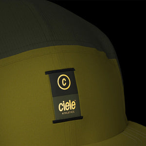 Ciele Athletics PBCap - C-Cube in Sogl from the front on a dark background showing the reflective detailing.