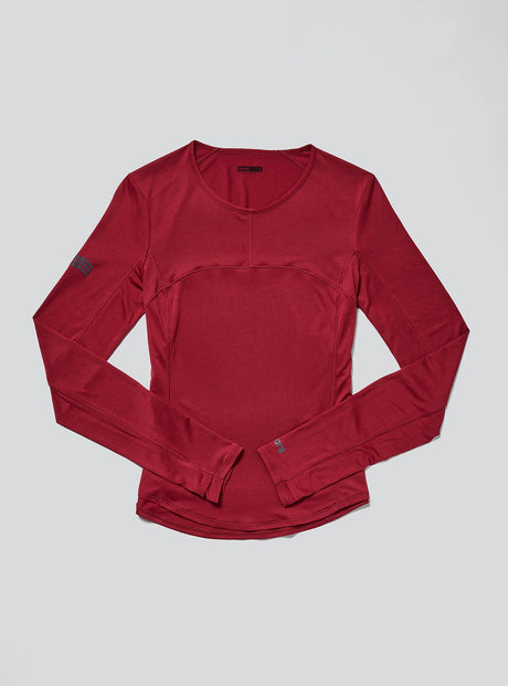 Janji W's Run All Day Long Sleeve in Spice on a neutral background.