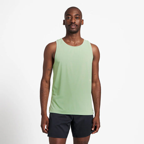 Ciele Athletics M DLYSinglet in Spruce worn by a man from the front on a neutral background.