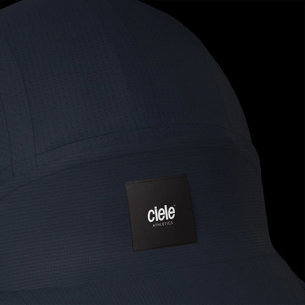 Ciele Athletics RDCap SC in Uniform on a dark background to show the reflective detailing.